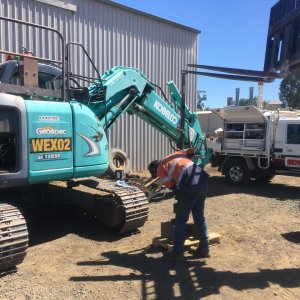 BDS Mechanical Repairs mechanic with blue digger