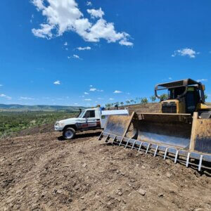 BDS Mechanical Repairs ute and agriculture heavy equipment on a large piece of land with blue skies