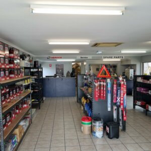Inside BDS Mechanical Repairs Mackay workshop front with spare parts on shelves