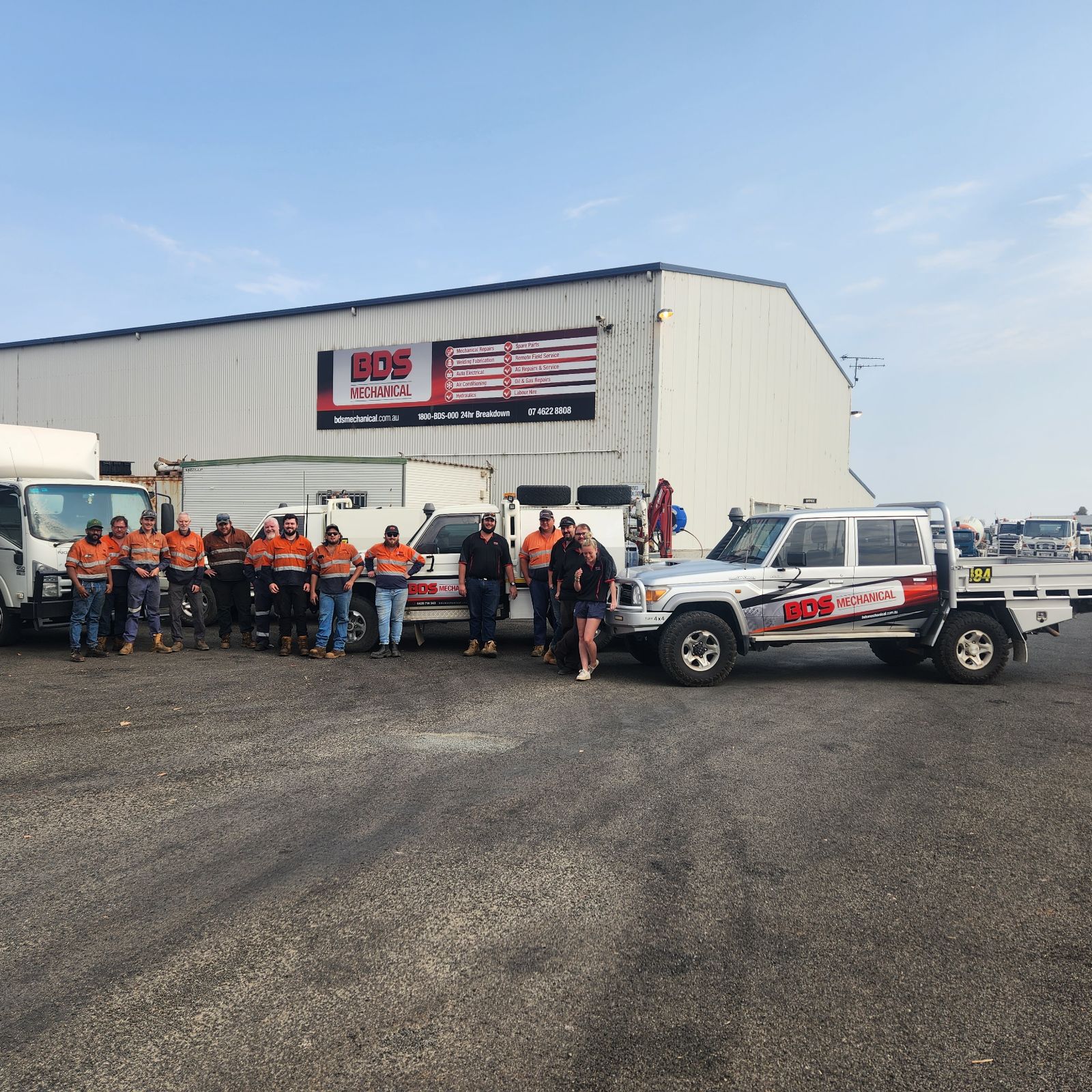 BDS mechanical repairs mechanics standing in front of the roma workshop