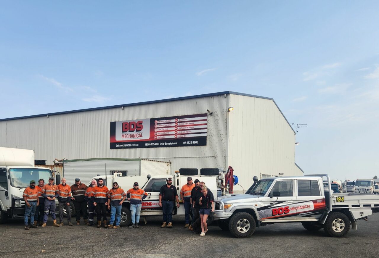 BDS mechanical repairs mechanics standing in front of the roma workshop