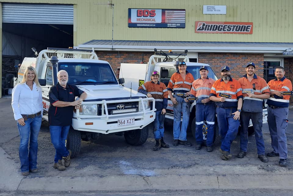 BDS Mechanical Repairs mechanics standing in front of the workshop with utes behind them